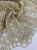 Кружевное полотно цвет золото (полиэстер), ширина 125 см Италия КИЗ/125/22100 по цене 4 650 руб./метр