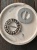 Пряжка цвет серебро (легкий пластик), диаметр 4 см (под пояс 2 см) Италия ПИС/40/31917 по цене 169 руб./штука