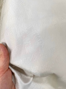 Плащевая ткань Just Cavalli цвет слоновой кости (полиэстер), ширина 145 см Италия ПИМ/145/33016 по цене 1 597 руб./метр