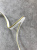 Кант молочного цвета с желтым краем (полиэстер), ширина 0,6 см Италия КИМ/6/49181 по цене 34 руб./метр